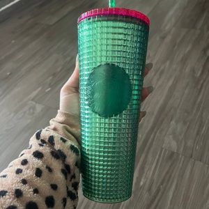 Green and hot pink Starbucks cup